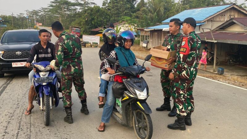 Satgas Pamtas RI-Malaysia Yonif 645/Gardatama Yudha Berbagi Di Bulan Penuh Berkah