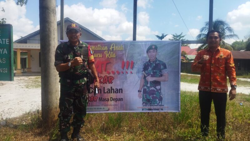 Koramil 1016-03/Sepang Bersama Aparatur Desa Pasang Spanduk Himbauan Bahaya Karhutla