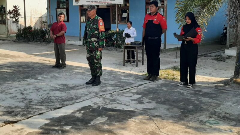 Sertu Masdianto Latihkan Tata Cara Upacara Di Lokasi TMMD Reg Ke-116, Kodim 1203/Ketapang.