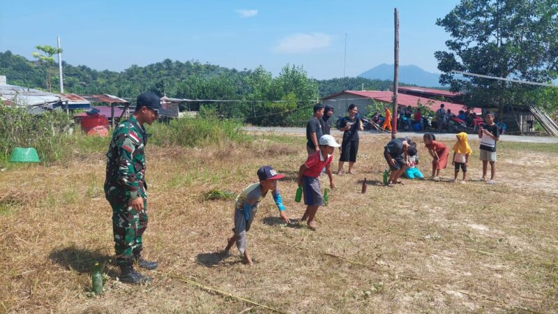 Satgas Pamtas Yon Armed 16 TK Meramaikan Perlombaan Permainan Rakyat Dalam Rangka HUT RI ke 78