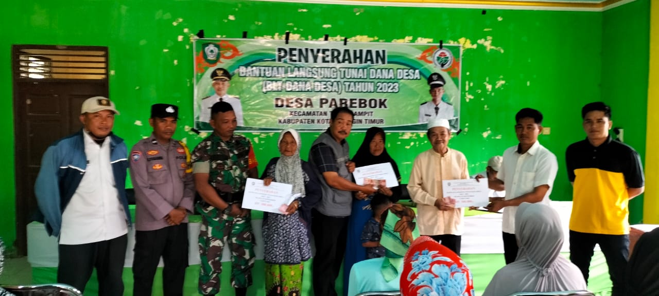 Babinsa Koramil 1015-01/Mentaya Hilir Selatan Turut Dampingi Penyaluran BLT-Desa Parebok