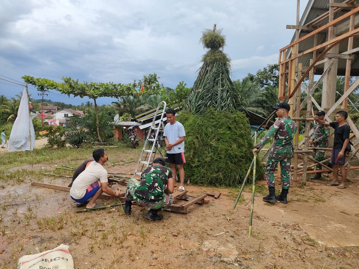 Pos Segumun Satgas Pamtas RI-Malaysia Yonarmed 16/TK melaksanakan kegiatan Karya Bakti di Gereja.