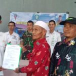 Babinsa Koramil 1015-01/MH Hadiri Musdes Pengesahan RKP Desa Ta 2025