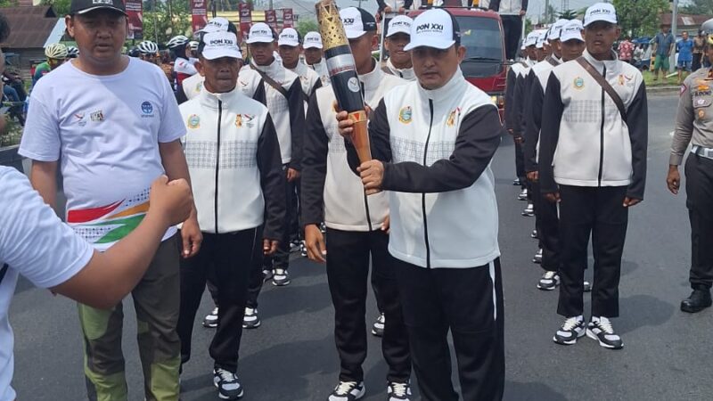 KONI Deli Serdang Sambut ‘Kirab Api PON XXI Aceh – Sumut 2024’ Didepan Tol Paluh Kemiri Lubuk Pakam