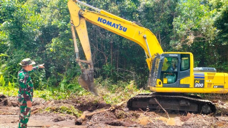 Satgas TMMD Reg ke-123 Terus Mengejar Kerjaan Di Titik Akhir Pengerasan Badan Jalan