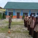 Kodim 1016/Plk Membangun Karakter Siswa SMKN 8 Palangka Raya Melalui Wasbang Dan Latihkan PBB