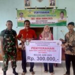 Babinsa Koramil 1015-07/Parenggean Dampingi Penyaluran BLT Dana Desa