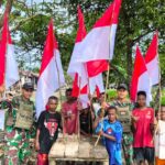Semangat Merah Putih di Perbatasan, TNI dan Warga Amyu Kibarkan Bendera Sambut HUT RI ke-80