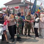 Jelang HUT RI ke-80, Kodim 0621/Kabupaten Bogor dan Forkopimda Bagikan Bendera Merah Putih di Jl. Tegar Beriman Cibinong