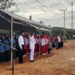 Pelaksanakan Upacara Bendera HUT RI Ke 80 Tahun 2025 di Desa Batu Agung