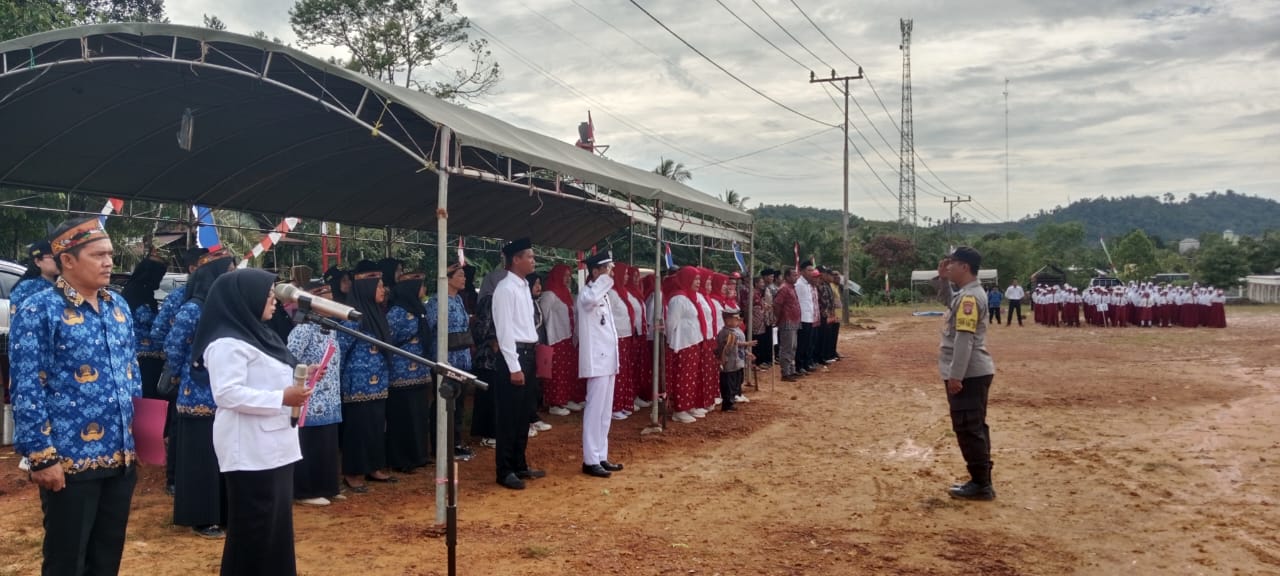 Pelaksanakan Upacara Bendera HUT RI Ke 80 Tahun 2025 di Desa Batu Agung