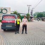 Polsek Panongan Laksanakan Strong Point Gatur Lalin di Perempatan Lugano Citra Raya