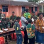 Satgas Yonif 763/SBA Berbagi Kebahagiaan di Wilayah Penugasan