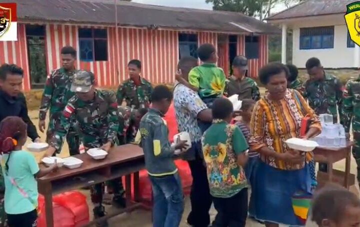 Satgas Yonif 763/SBA Berbagi Kebahagiaan di Wilayah Penugasan