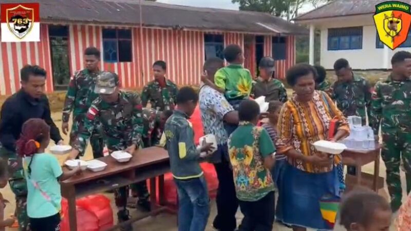 Satgas Yonif 763/SBA Berbagi Kebahagiaan di Wilayah Penugasan