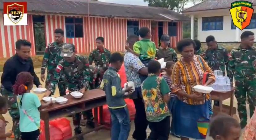 Satgas Yonif 763/SBA Berbagi Kebahagiaan di Wilayah Penugasan