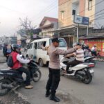 Polsek Pasar Kemis Gelar PECAK Pagi, Arus Lalu Lintas di Pertigaan VTE Lancar Terkendali