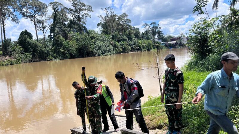 Guna Mempercepat Pembagunan Jembatan Garuda, Personil Kodim 1015/Sampit Bersama Konsultan Laksanakan Pengukuran.