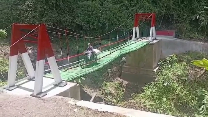 Kodim 0212/TS Tuntaskan Pembangunan Jembatan Gantung Penghubung Dua Desa di Ulu Pungkut