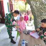 Satgas Pamtas RI–Malaysia Yonarmed 19/Bogani Gelar Pengobatan Gratis Bagi Masyarakat Desa Tombolango