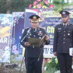 Kapolres Kotim Pimpin Upacara Pemberangkatan dan Pemakaman Alm. Aiptu Choirul Anwar dengan Khidmat