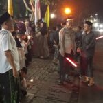 POLSEK TIGARAKSA MELAKSANAKAN KEGIATAN PENGAMANAN PAWAI OBOR DI DARKUM POLSEK TIGARAKSA POLRESTA TANGERANG