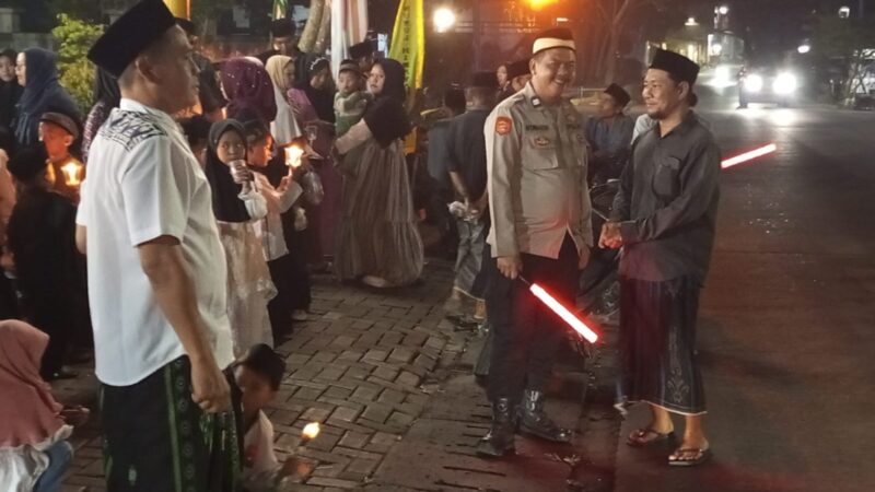 POLSEK TIGARAKSA MELAKSANAKAN KEGIATAN PENGAMANAN PAWAI OBOR DI DARKUM POLSEK TIGARAKSA POLRESTA TANGERANG