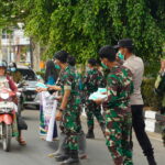 Kodim 1015/Spt Bersama Polres Kotim dan PT. Baratama Putra Perkasa Bagikan Ribuan Masker.