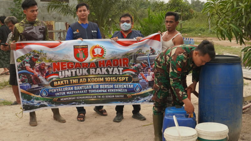 Kekeringan Melanda, Kodim 1015/Sampit Bersama Muhammadiyah Sampit Salurkan Air Bersih di Desa Telaga Baru